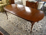 CHERRY HICKORY CHAIR COMPANY QUEEN ANNE OVAL DINING TABLE WITH 2 LEAVES. MEASURES APPROX. 64