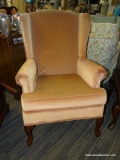 ONE OF A PAIR OF QUEEN ANNE WING CHAIRS DUSTY ROSE COLORED.