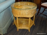 ONE OF A PAIR OF WICKER GLASS TOP END TABLES WITH LOWER SHELF. MEASURES APPROX. 22