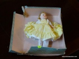 (R2) MADAM ALEXANDER #1225 LITTLE WOMEN AMY DOLL IN YELLOW DRESS. INCLUDES BOX WHICH SHOWS DAMAGE.