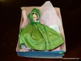 (R2) MADAM ALEXANDER #1385 SCARLETT DOLL IN GREEN DRESS. COMES IN ORIGINAL BOX WHICH DOES SHOW SOME