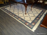 MACHINE MADE APPROX. 7' X 9' FLORAL ROOM SIZE AREA RUG.