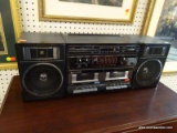(R4) SANYO AM/FM DOUBLE CASSETTE STEREO. MODEL #C35. COMES WITH A DETACHABLE SPEAKERS ON EACH SIDE,