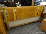 (R4) HUNTLEY BY THOMASVILLE OAK FINISHED QUEEN SIZE HEADBOARD. APPEARS TO BE IN GOOD CONDITION.
