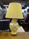 (R4) YELLOW FLORAL GINGER JAR CONVERTED TO A LAMP WITH PIERCED BRASS FEET. COMES WITH SHADE &