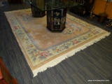 APPROX 8 X 10 ROYAL AUBUSSON ORIENTAL RUG . COLORS ARE PINK, TEAL, WHITE, AND GREEN.
