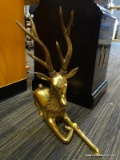 1 OF A PAIR BRASS RUSTING 6 POINT DEER. WITH A VERY ORNATE NECK. MEASURES 22 IN LONG. 5 IN WIDE.