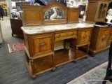 GERMAN MARBLE TOP SERVER WITH MIRRORED BACK CARVED WALLNUT ON DOORS.
