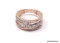 24K ROSE GOLD OVER STERLING SILVER GENUINE DIAMOND RING. THIS BEAUTIFUL YET SUBTLE STATEMENT RING IS