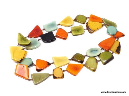 COLORFUL NATURALLY DYED, POLISHED ECUADORIAN TAGUA NUT CHIP NECKLACE. FROM THE AMAZON RAIN FOREST