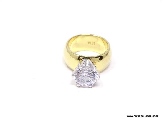 HUGE, SETA SIGNED, 24K GOLD PLATED SOLITAIRE ENGAGEMENT RING. SECURELY SET IN A SIX POINT SETTING,