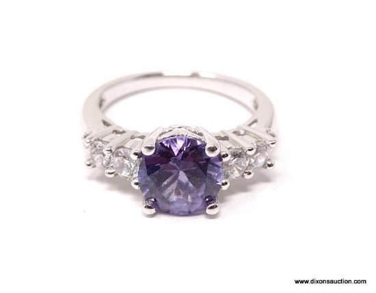 SOPHISTICATED AND REFINED BEST DESCRIBES THIS LADIES' GEMSTONE RING WITH A ROUND CUT LAVENDER