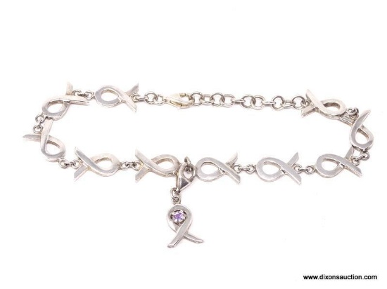 STERLING SILVER CAUSE AWARENESS RIBBON BRACELET. FEATURES RIBBON SHAPED LINKS, 5 ON EACH SIDE FACING