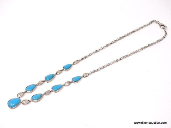 DESIGNER SIGNED, WHITNEY KELLY STERLING SILVER AND TURQUOISE NECKLACE. FEATURES 5/8" LONG SLEEPING