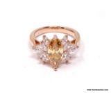 ROSE GOLD OVER STERLING SILVER DESIGNER RING, HALLMARKED WITH A DIAMOND SHAPED MARK AND .925.