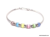 VINTAGE STERLING SILVER AND MULTI COLORED CAT'S EYE BEADED BRACELET. FEATURES CAT'S EYE BEADS IN