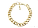 QUALITY HEAVY GOLD TONE CURB LINK STATEMENT NECKLACE. FEATURES EXTRA LARGE, THICK LINKS AND AN