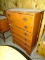 LEA LINE LEADS WOODEN CHEST OF DRAWERS WITH 6 DOVETAIL DRAWERS. MEASURES 32
