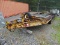 HEAVY DUTY 25' FLATBED 6-WHEELED EQUIPMENT TRAILER WITH RAMPS. HEAVILY RUSTED AND WOOD FLOOR NEEDS