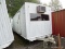 WHITE CONTRACTOR OFFICE TRAILER. RUSTED. PLEASE PREVIEW FOR CONDITION. COME PREPARED TO MOVE IT.