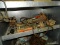 SHELF LOT OF MISCELLANEOUS SMELTING TOOLS. INCLUDES: 1 SMELTING LADLE, 2 SMELTING POTS, A WELDING