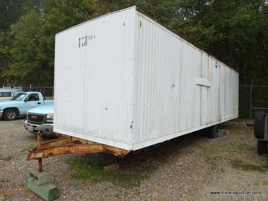 WHITE CONTRACTOR OFFICE TRAILER. RUSTED. PLEASE PREVIEW FOR CONDITION. COME PREPARED TO MOVE IT.
