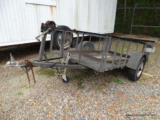 10' X 5' BLACK PULL BEHIND UTILITY TRAILER WITH RAMP. COMES WITH WINCH AND SPARE TIRE. MEASURES 15'