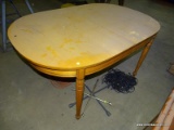 LIGHT COLORED OVAL SHAPE WOODEN KITCHEN TABLE . NO LEAF. MEASURES APPROX. 5' X 3' 3.5