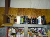 CONTENTS ON TOP OF CABINET TO INCLUDE: MOTOR OIL, BRAKE FLUID, AND GEAR OIL. SOME MAY BE