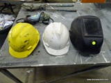 (3) PIECE LOT TO INCLUDE: 1 FIBRE-METAL SH10 PC WELDING HELMET AND 2 HARDHATS.