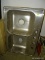 STAINLESS STEEL DOUBLE BOWL SINK WITH 4 HOLES.
