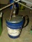 BUCKET OF USED VALVOLINE GEAR OIL AND PUMP ATTACHMENT.