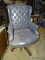 VINTAGE EXECUTIVE OFFICE CHAIR. BLUE WITH BUTTON BACK AND EAT. NAILHEAD TRIM. NEEDS WORK.