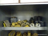 SHELF LOT OF WATER LINE PARTS.