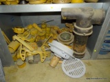 SHELF LOT OF WATER LINE PARTS.