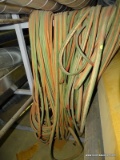LOT OF LONG RED/GREEN DOUBLE AIR HOSES.