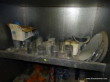 SHELF LOT TO INCLUDE: PIECES OF DUCTING, SOLENOID COIL KITS, AND ROUND SHEET METAL CUT OUTS.