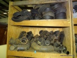 (2) SHELF LOTS OF CAST IRON PIPE FITTINGS (VARIOUS DIFFERENT KINDS) & MISC. RUBBER SEALS.