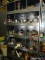 CONTENTS OF SHELVING UNIT TO INCLUDE: SPRAY PAINT, PRIMER, JOINT TAPE, BUTTERFLIES, EXTRA LARGE