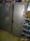 GALVANIZED STEEL INDUSTRIAL STORAGE CABINET. HAS 2 LOCKING DOORS THAT OPEN TO 3 INTERNAL SHELVES.