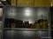 SHELF LOT OF ASSORTED CAST IRON PIPE PARTS.
