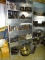 ENTIRE SHELVING UNIT FILLED WITH ASSORTED CLAMPS, RUBBER PIPE FITTINGS, CAST IRON FITTINGS, LARGE
