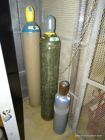 (3) LARGE GAS BOTTLES. ACETYLENE AND NITROGEN.