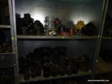 (2) SHELF LOT OF BLACK CAST IRON PIPE FITTINGS.