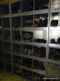 ENTIRE CUBBY UNIT LOT OF ASSORTED BLACK PVC PIPE FITTINGS, WITH TEES, TWYE, 45 DEG, 90 DEG, ETC.