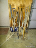 LARGE LOT OF YARD TOOLS TO INCLUDE: SHOVELS, SLEDGE HAMMER, HOE, PICKAXE, SNOW SHOVEL, ETC.