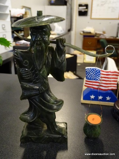 JADE CARVED ORIENTAL MAN WITH LARGE HAT CARRYING JUGS OF WATER. MEASURES 7" TALL.