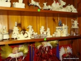 (FM) SNOWBABIES; SHELF LOT OF DEPT. 56 SNOWBABIES- 8 TOTAL- 3 IN- 8 IN H ( CAT ON FIREPLACE NEEDS