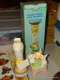 (FM) EASTER THEMED CANDLE HOLDER; IS IN THE ORIGINAL BOX. NEEDS TO BE REPAIRED. MEASURES 12 IN TALL