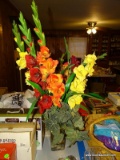 (FM) ARTIFICIAL FLORAL ARRANGEMENT; IS IN YELLOW, ORANGE, RED, AND WHITE WITH A GLASS VASE. MEASURES